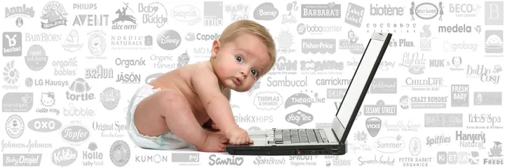 Baby model working beside a laptop for a commercial campaign